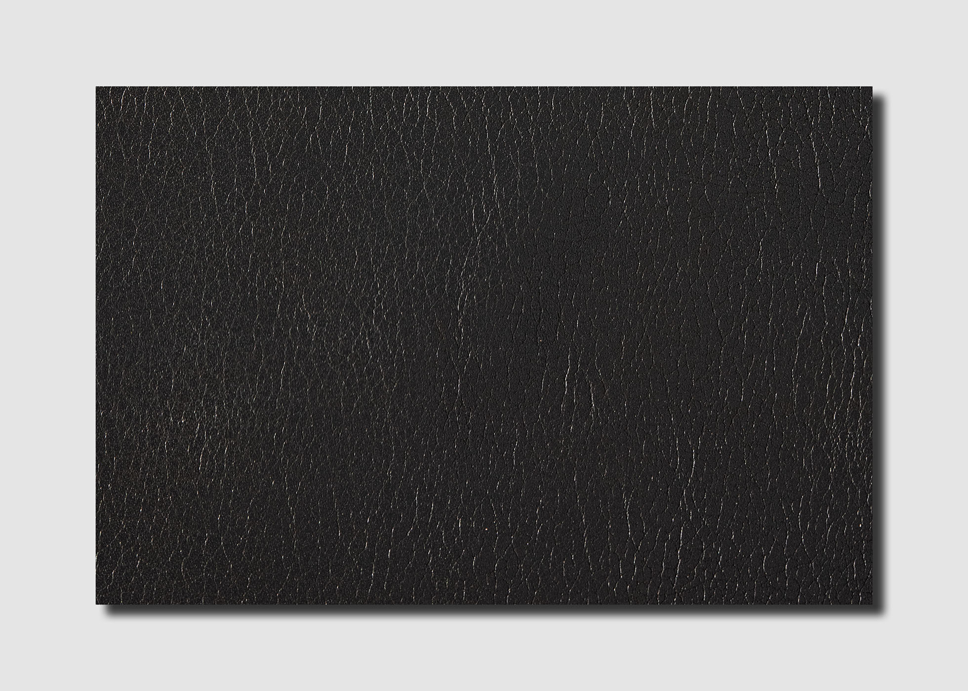 Leather - Cowhide - Side - embossed and pigment covered black (1,2 mm) - 2,14m²